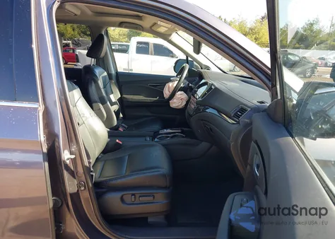 2021 Honda Pilot Awd Touring 7 Passenger z USA, uszkodzony, nr VIN 5FNYF6H62MB033604